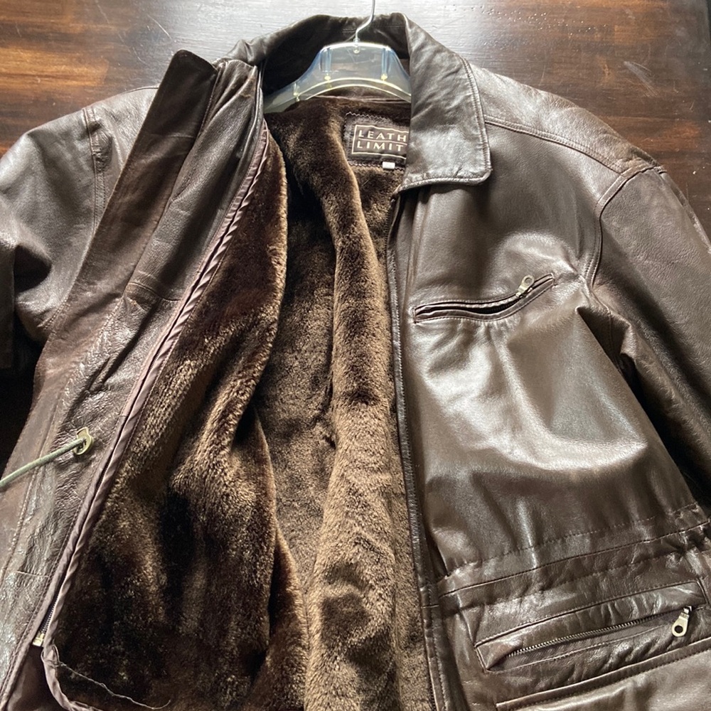 Leather Jacket with faux fur lining.